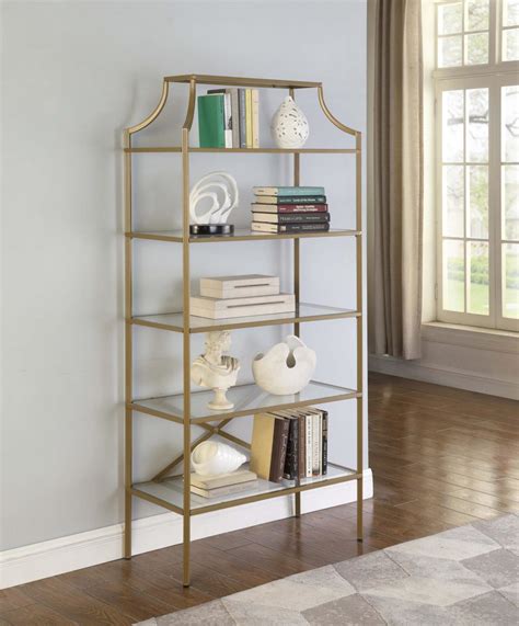 gold shelving with glass shelves